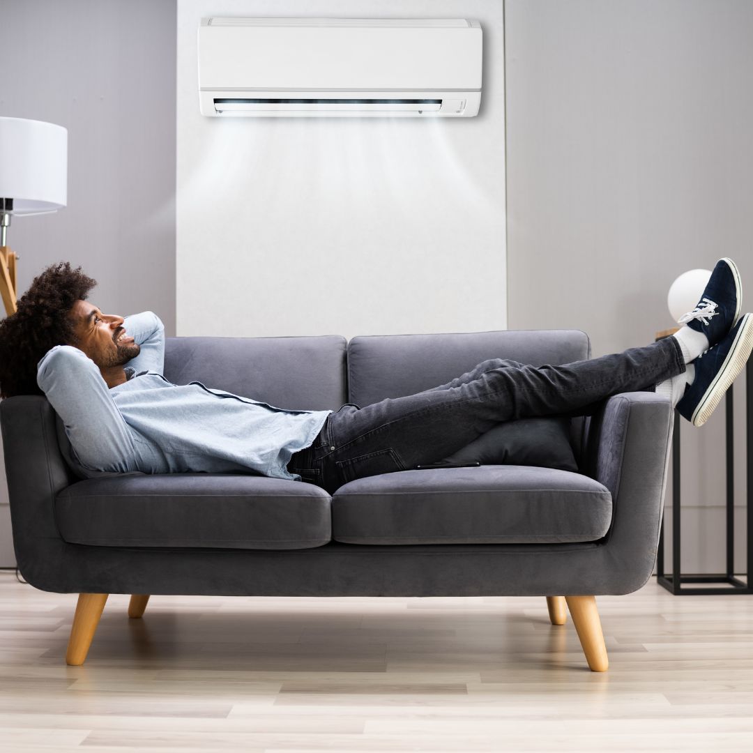 man relaxing in cool home