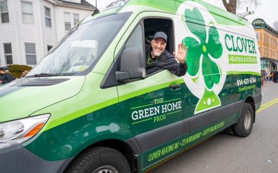 Clover HVAC technician inside a branded service van, ready to provide fast, reliable heating and cooling repairs.